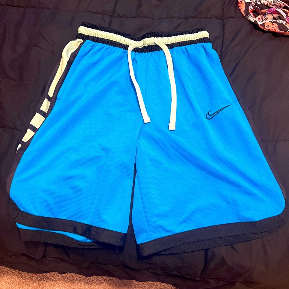 Blue Nike shorts
